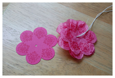 4 Now put trhough the cardstock flower and pull though